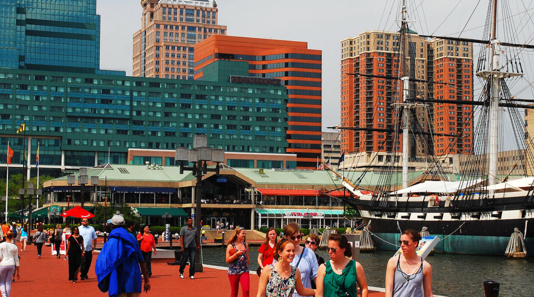 Photo of people walking in Inner Harbor, Baltimore